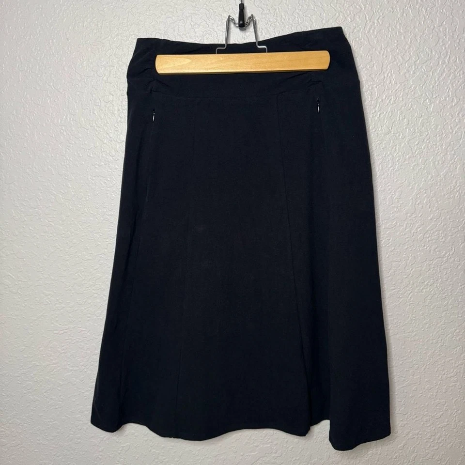 Falda SCOTTeVEST The Sandra Línea A Negra Bolsillos con Cremallera Elastizada Comodidad Talla S Foto 2 de 4