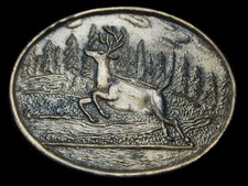 KL15107 VINTAGE 1970s BIG BUCK DEER RUNNING THROUGH STREAM BELT BUCKLE