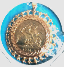 GEORGE V 1914 22ct FINE GOLD FULL SOVEREIGN SET IN LARGE GOLD MOUNT  9.5 GRAMS 3361.47 per troy oz