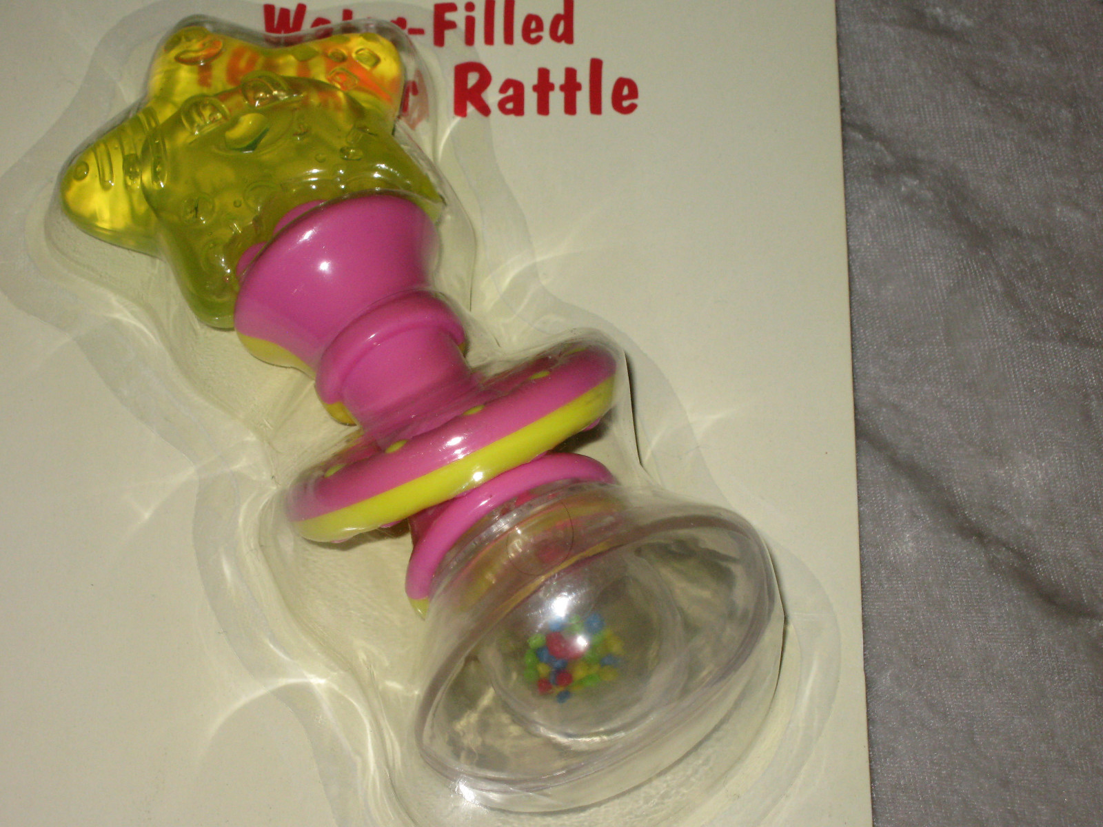 Pink Travel Reusable Bib Kangaroo Pocket Water Filled Rattle Baby Play Feed NEW!