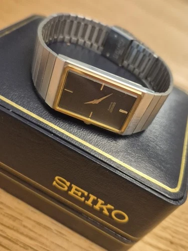 vintage gold-plated Seiko Tank Quartz watch,black dial, stainless steel bracelet