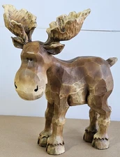 Moose about 15" high, 11" long, solid hard plastic to look carved
