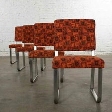 4 Streamline Modern Railroad Dining Car Chairs in Stainless Steel & Orange Abstr