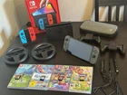 Nintendo Switch OLED Handheld Console 64GB with Games and Accessories