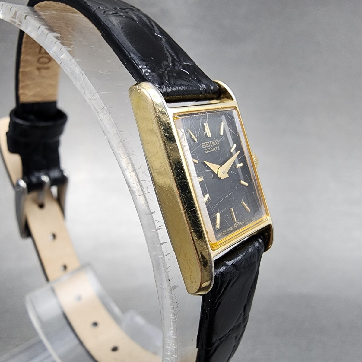 Seiko Tank Watch Women 14mm Black Dial Gold Tone Rectangle 1F20