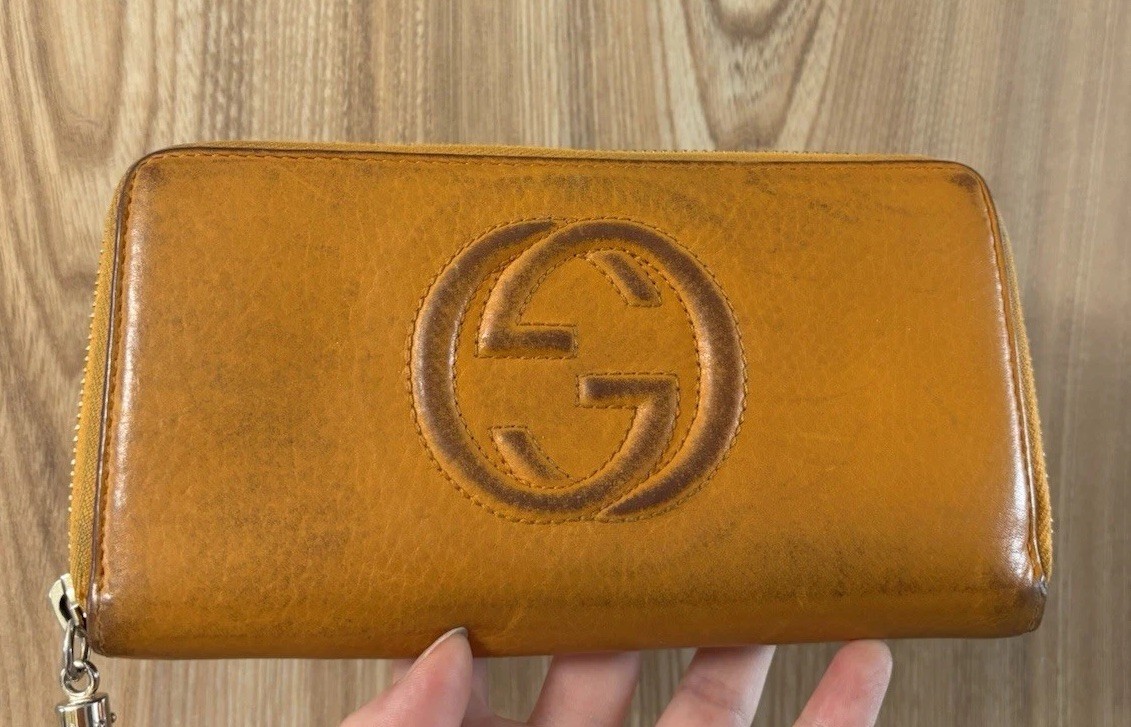 GUCCI Orange Leather Long Wallet with Logo, Zipper & Tassel Design