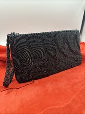 Neiman Marcus Black Beaded Clutch / Wristlet Bag. Nicely beaded. Mint condition.