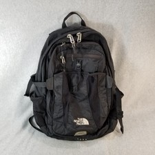 black and rose gold north face bookbag