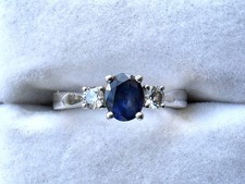 Platinum Three Stone Sapphire & 14pts Diamond Ring (Size L)