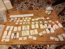 VINTAGE / ANTIQUE mix and match sport clothing GAME not complete. 