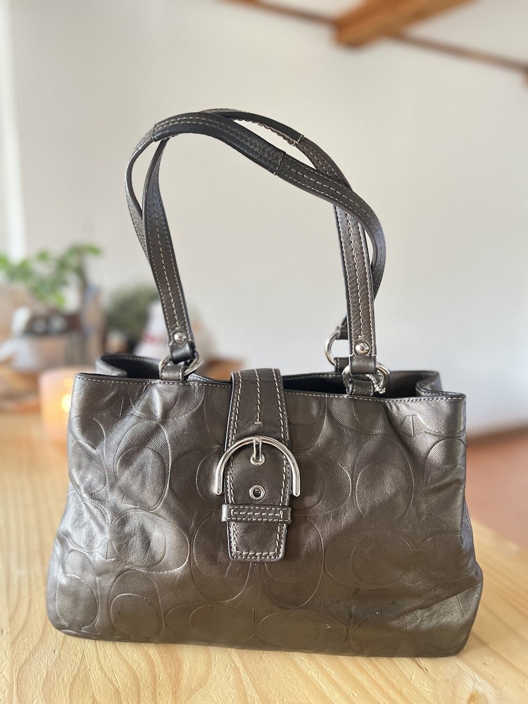 coach logo embossed brown leather with buckle shoulder bag (See Pics For Details