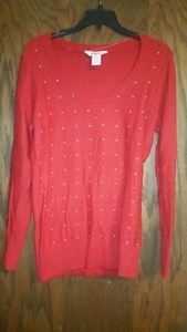 red sparkly sweater