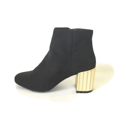 black boots gold heel