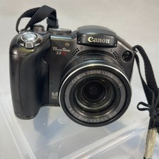 Canon PowerShot S3 IS 6.0MP Digital Camera Powers On LCD Works Sold As Is Parts
