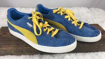 blue and yellow puma trainers