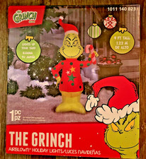 4 ft. LED The Grinch in Ugly Sweater Candy Cane Christmas Airblown Inflatable