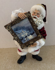 KURT ADLER Satna Holding Thomas Kinkade Picture Resin Figurine 10" x 5"