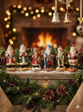 Vintage Set Of Santa Figurines Depicting The Change Of Santa Over Years