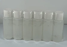 New Six Pack Empty Plastic 2 Ounce Fliptop Bottles