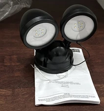 Defiant 1200 Lumen Black Motion Sensing Dusk to Dawn flood light 180 Degree