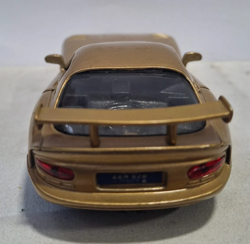 Винтажный литой автомобиль Maisto масштаб 1:38 Dodge Viper GTS Gold TC-241 - Изображение 4 из 4
