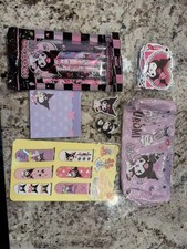 Set of Kuromi-themed stationery items, including gel pens, a notepad, stickers