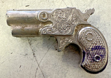 VINTAGE MINIATURE ROUND DERRINGER CAP PISTOL TOY METAL