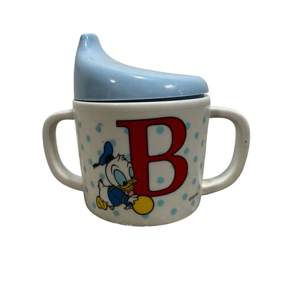 Taza de colección Disneyland taza Selandia melamina plástico bebé minniemouse Donald difícil de encontrar Foto 2 de 4