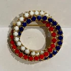 Vtg Rhinestone & Milk Glass Intertwined Circles Patriotic Red White Blue Brooch