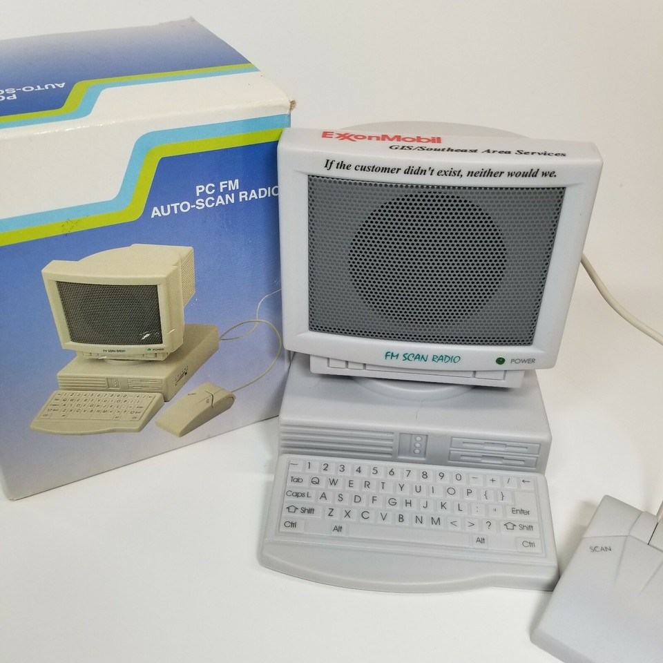 A novelty mini-PC-shaped FM radio that Exxon Mobil gave to employees — corporate swag from the 90s that's now a gloriously weird desk artifact.