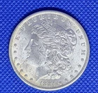 1884 O Morgan Silver Dollar, 90% fine, Unc, with some sack scratches, see photo