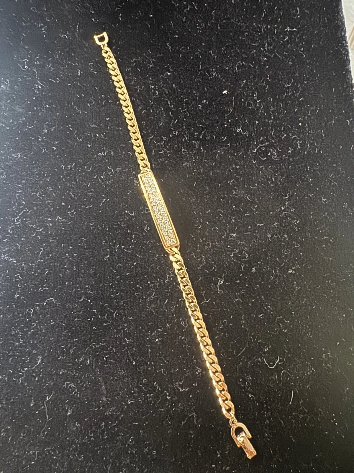 Bracelet Christian Dior cristaux pavés ton or avec boîte. Magnifique !