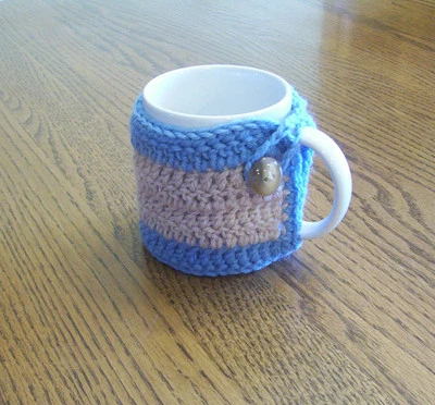 Hand Crochet Tan and Light Blue Buttoned Coffee Mug Cozy - Image 1 of 3