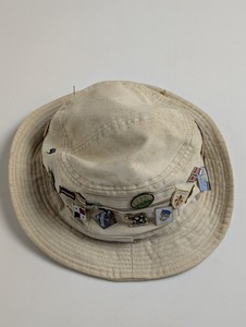Vintage Bucket Hat with 37 Travel & World Flag Enamel Pins. 