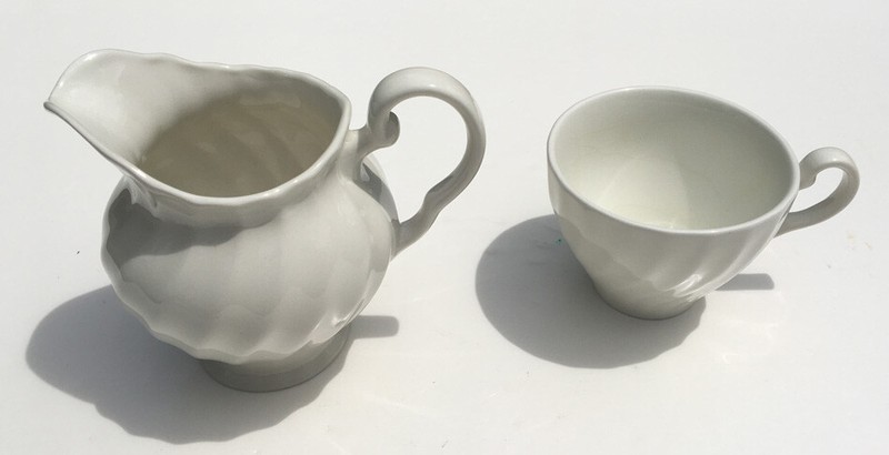 VINTAGE WHITE PITCHER AND TEA CUP "MADE IN ENGLAND"