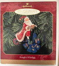 Hallmark Keeppsake Christmas Ornament Santa Kringle's Whirligig 1999  NEW