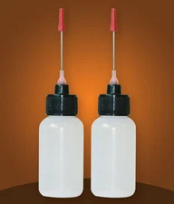 Two 1 OZ bottles with needle tip dispenser