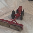 Ford Vintage Red and Black Cast Iron Farm Tractor with Roller Attachment — photo 5