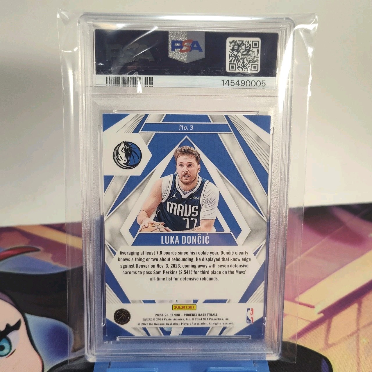2023 Panini Phoenix Paragon Luka Doncic #3 Blue Ice Maverick PSA 8 view 3