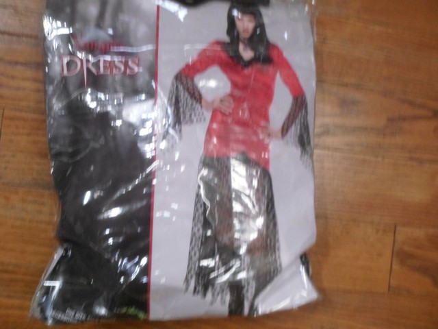 Women's Vampire Costume Halloween Sexy Dress NWT. 1 sz fits most. Costumes Women's Vampire Costume Halloween Sexy Dress NWT. 1 sz fits most. Costumes