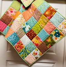 Hand made baby sized patchwork quilt. Brand new. Nursery decor.