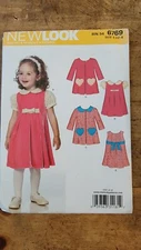 Simplicity Sewing Pattern 6769 Sizes 1/2 - 4 Childs Dresses 4 Variations Uncut 