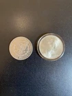 1923 Peace Silver Dollar; 1900 O Morgan Silver Dollar Fine-very fine