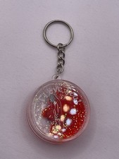 Resin Made Gold Heart Pendant With Color Accents Shiny Beautiful Keychain