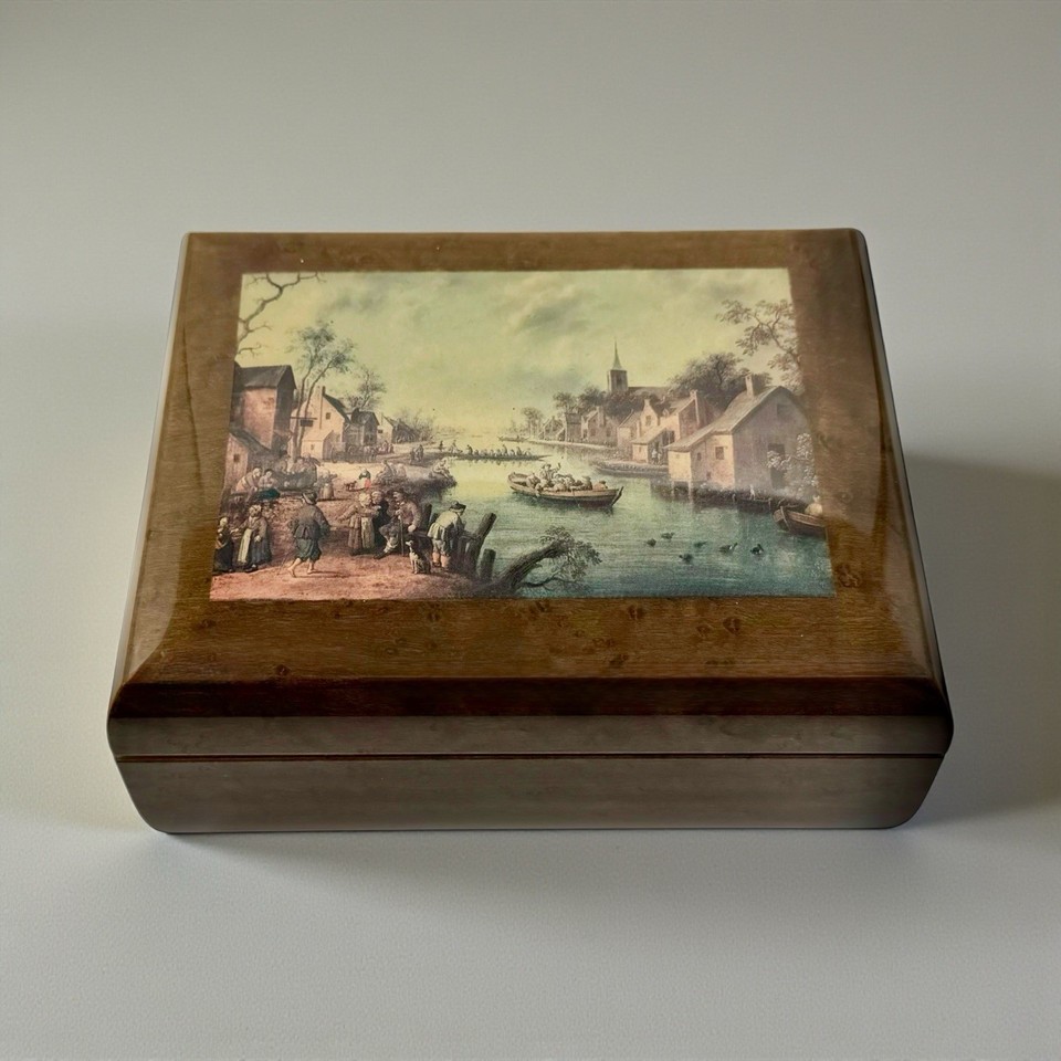 A hand-crafted Sorrento marquetry wood music box featuring a Dutch village scene after Droochsloot — where fine Italian woodworking art meets a quirky old-master painting reproduction.