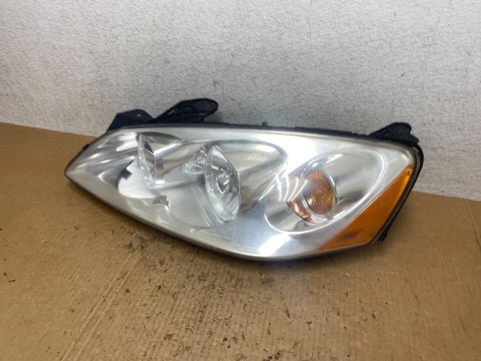 Faro halógeno lateral izquierdo Pontiac G6 2005 a 2009 OEM Q7999 DW Foto 2 de 4