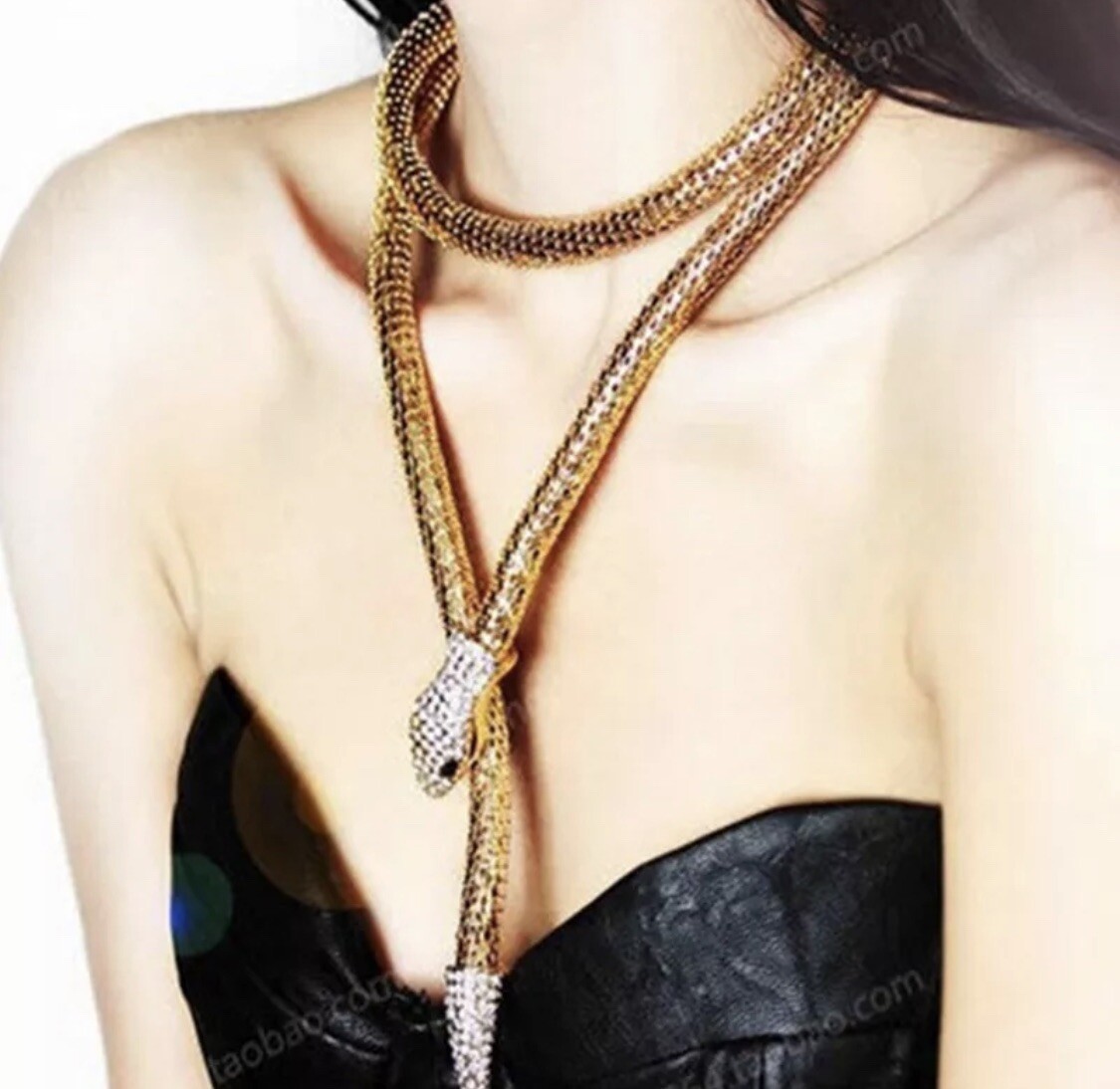 Collana a forma di serpente tono oro foto 3