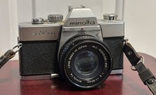 Minolta SRT 100 film camera w/ MC Rokkor-PF 1:2 f 50mm lens