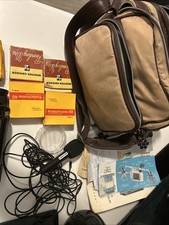 Vintage Bell and Howell 252 8mm Leather Movie Camera w/lens cap, carrying case 