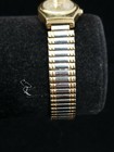Women's Armitron Quartz Silver Dial Gold Stretch Band 25/5394-5 Watch Scratched — photo 3